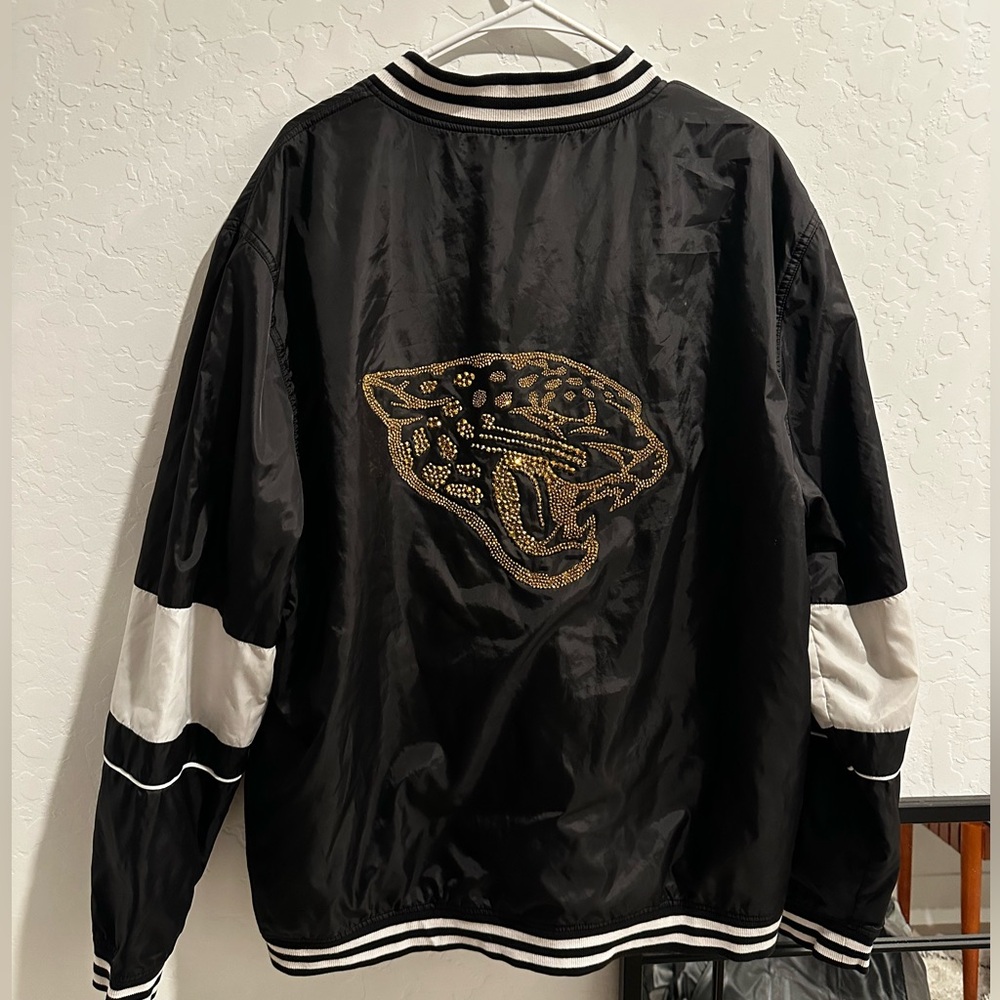 Upcycled/bedazzled Jacksonville Jaguars bomber jacket